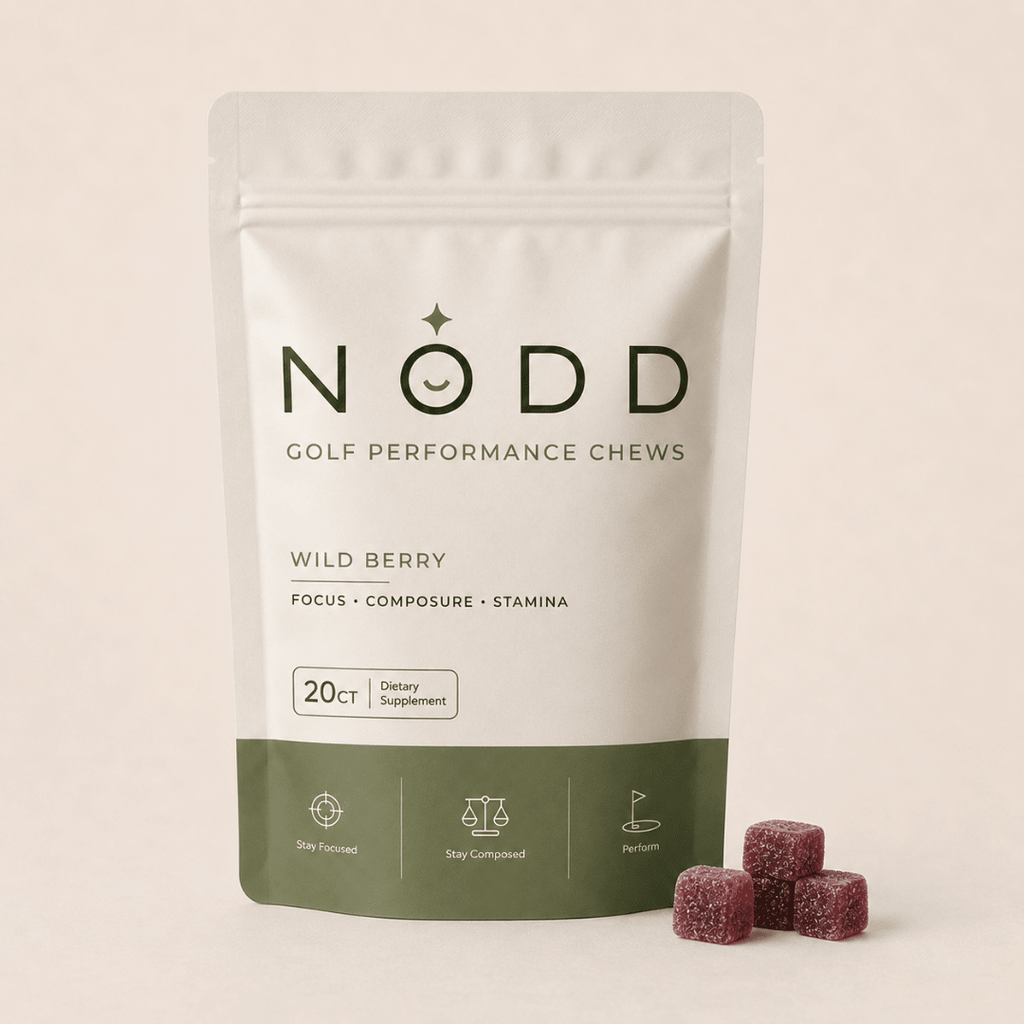 A stand-up pouch of NODD Golf Performance Chews in Wild Berry flavor, shown on a light beige background with three berry-shaped chews placed in front.