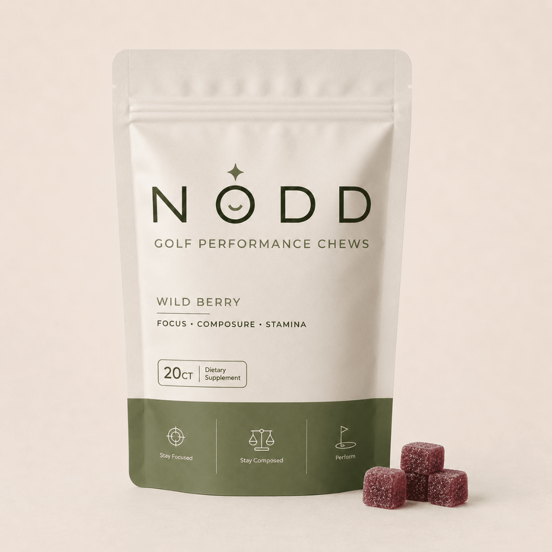 A stand-up pouch of NODD Golf Performance Chews in Wild Berry flavor, shown on a light beige background with three berry-shaped chews placed in front.
